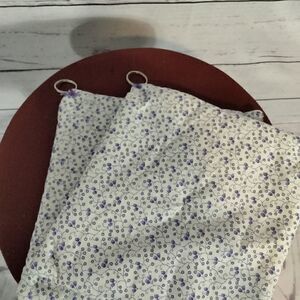 Never used. "Evelyn Jacobs" ( my mom) homemade pot holders for looks